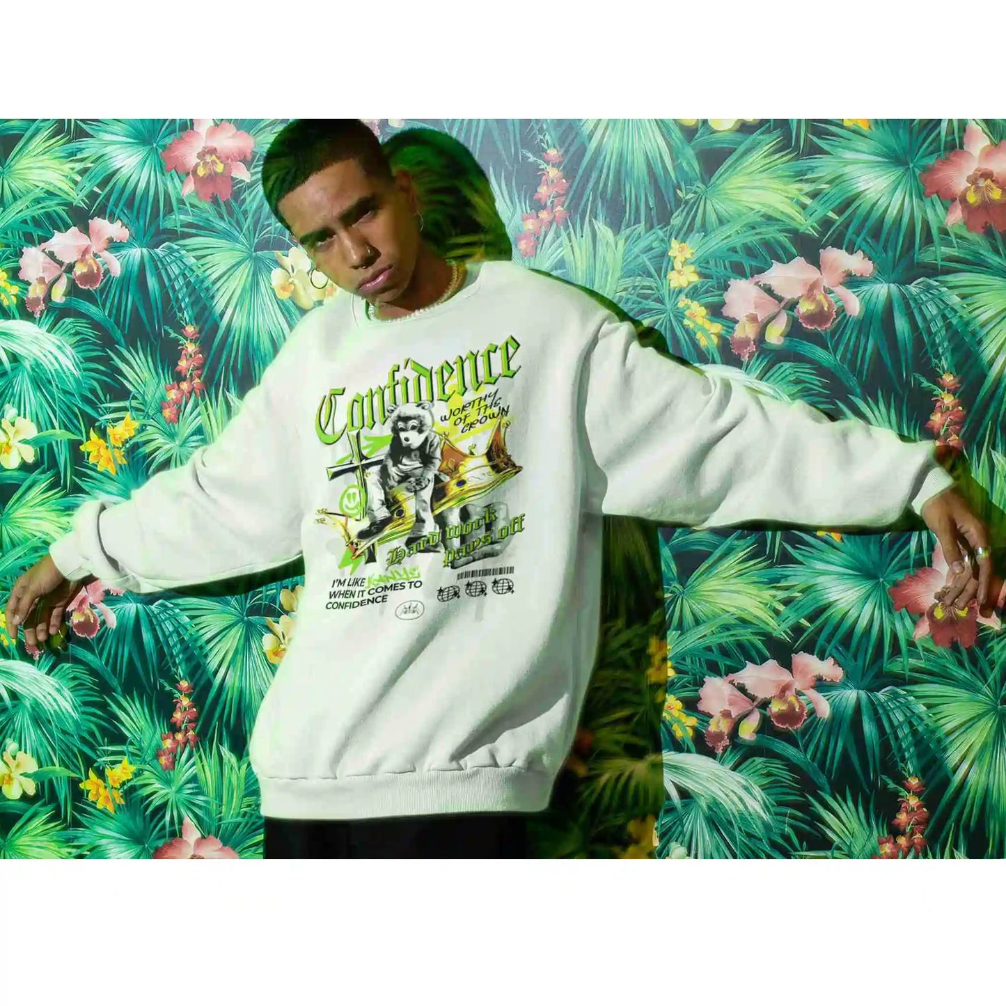 Male model posing in front of flower wallpaper wearing Confidence crew