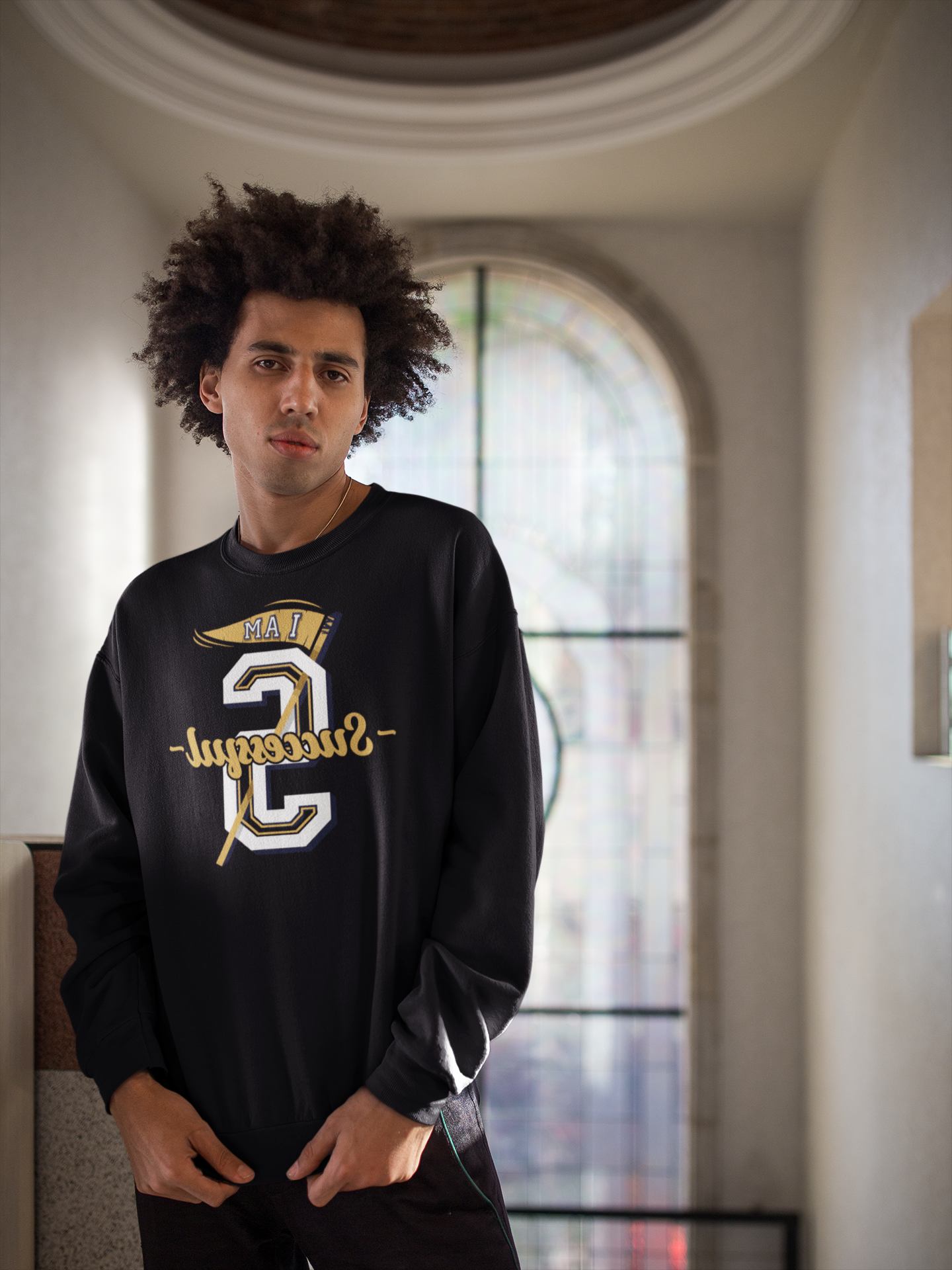 Man posing in a Black "I Am Successful" mirror print sweatshirt.